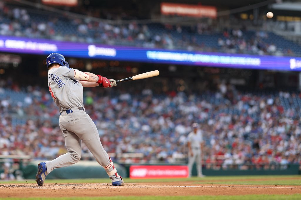 Aug 11, 2026; Washington, District of Columbia, USA; Chicago Cubs center fielder Pete Crow-Armstrong (4) hits a solo home run against the Washington Nationals during the third inning at Nationals Park. Mandatory Credit: Geoff Burke-Imagn Images
